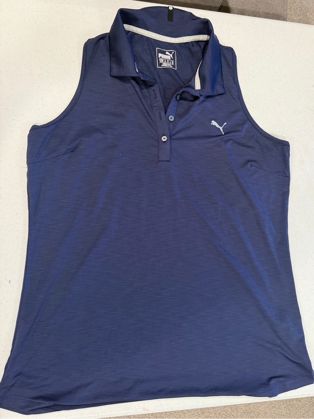 Puma Woman’s Sleeveless Golf Racerback Polo in Navy Blue